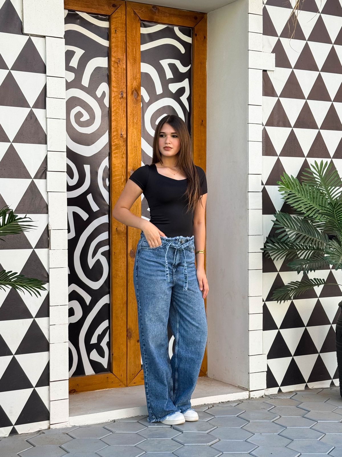 straight blue jeans with belt straps